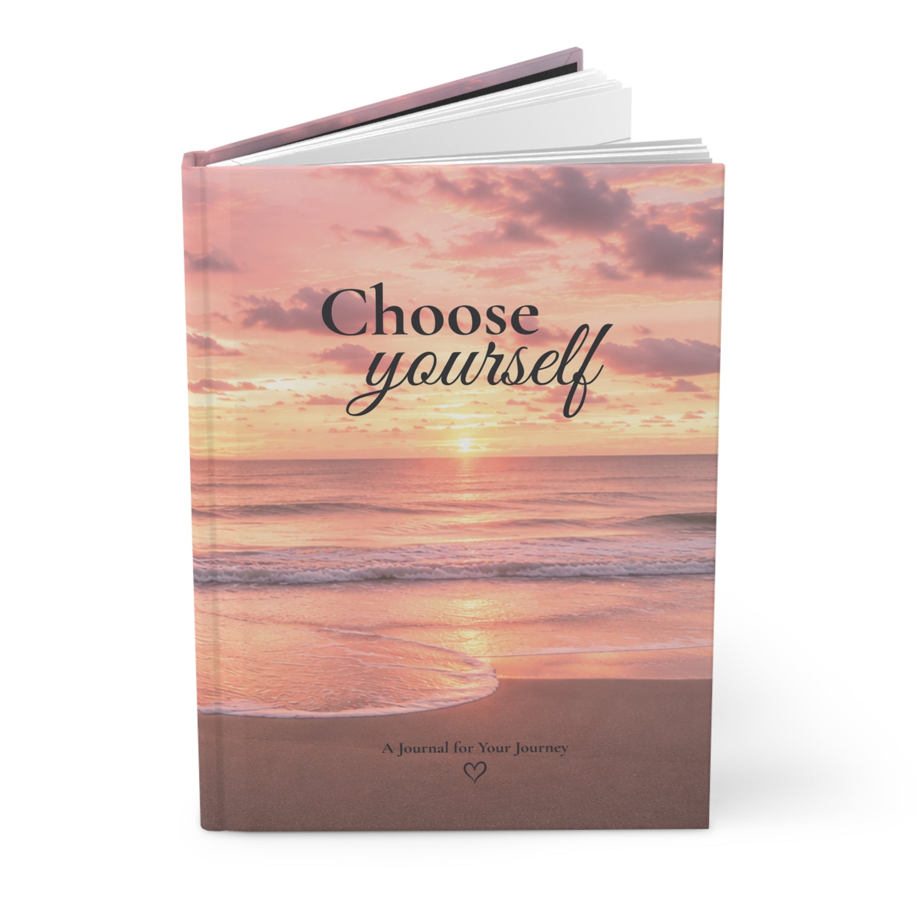 Angled view of the Choose Yourself journal showing the sunset cover and black spine